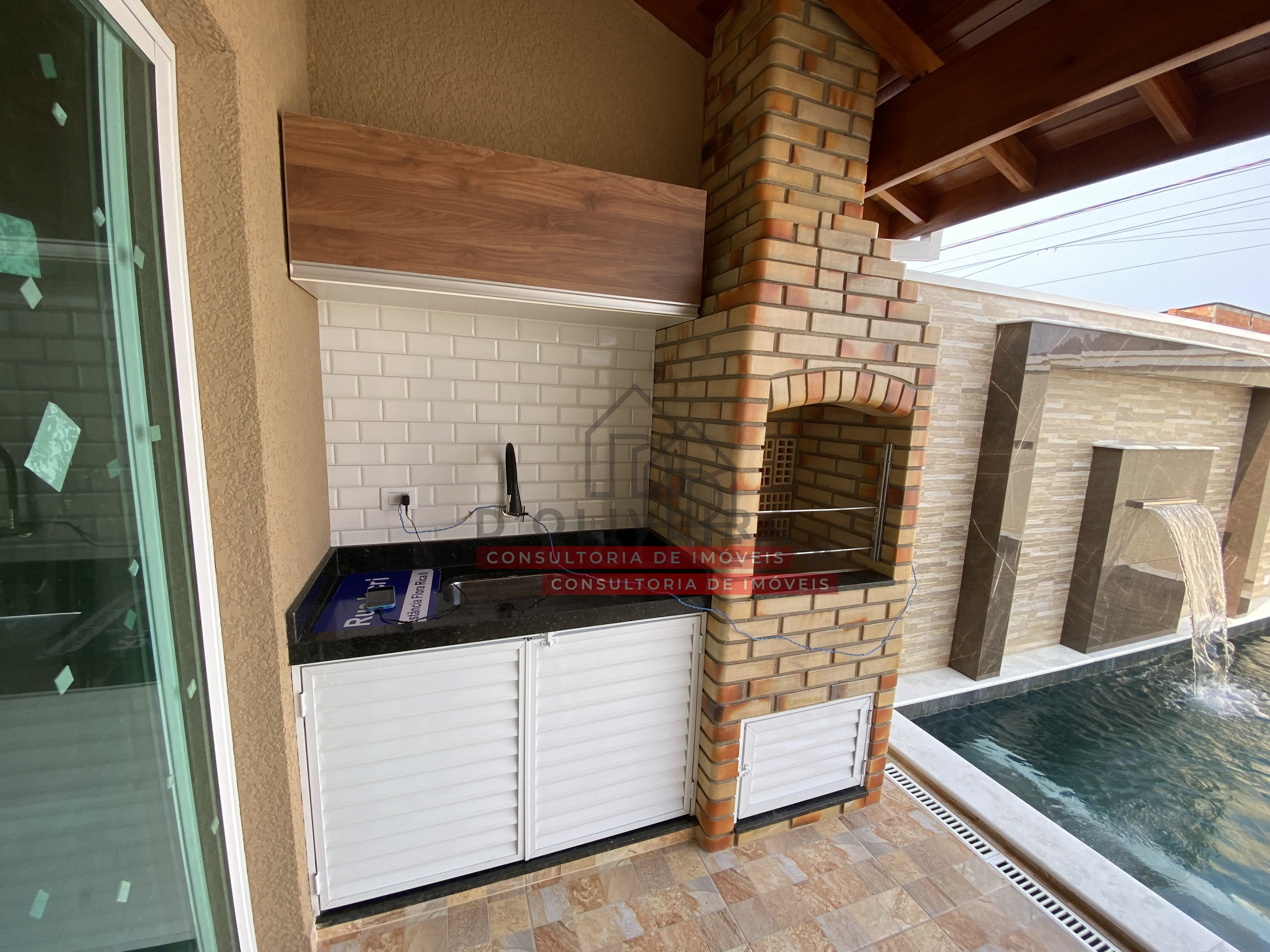 Casa geminada com piscina à venda no Flora Rica 2 - Peruíbe - SP