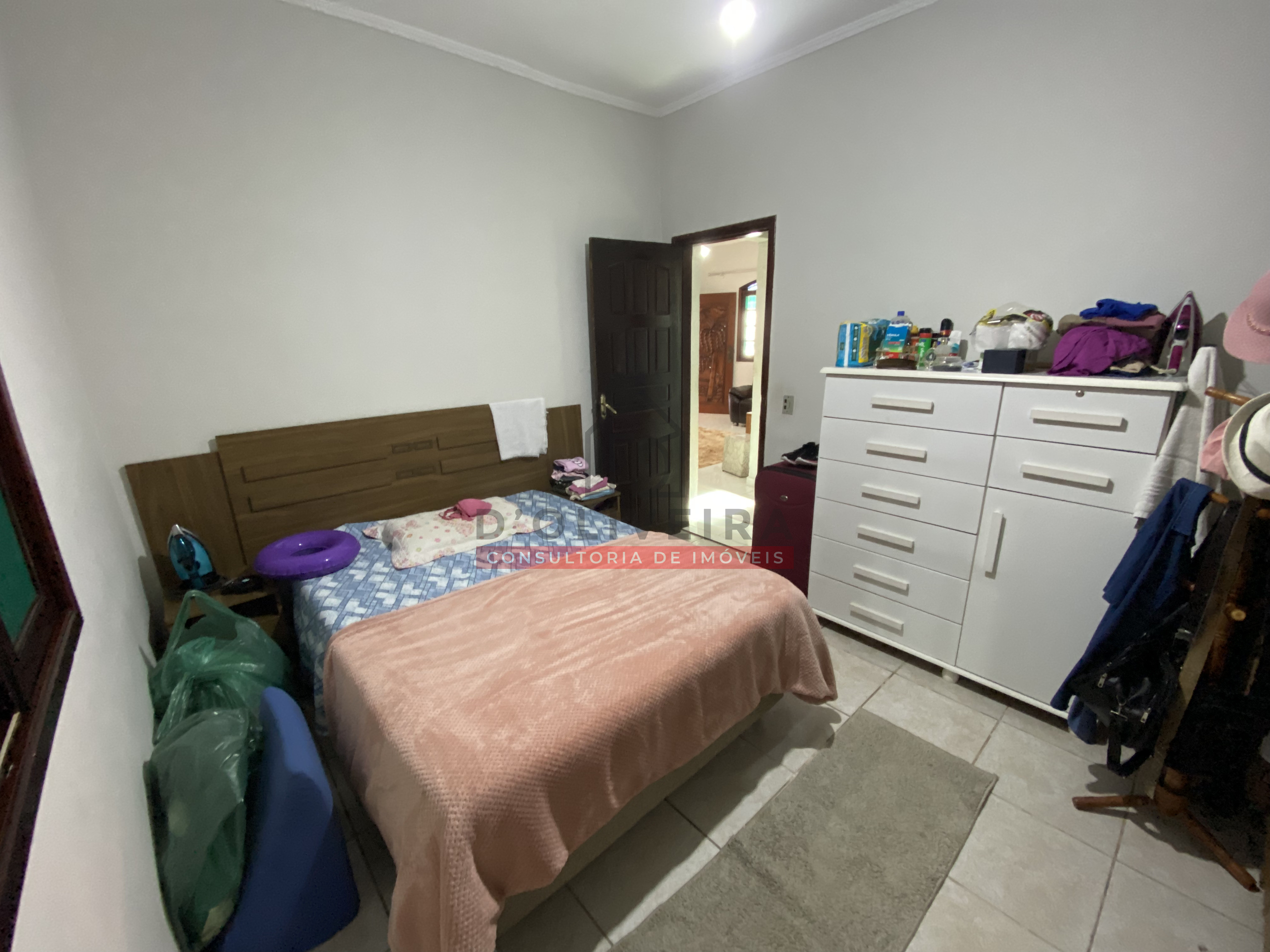 Casa térrea com edícula e churrasqueira no Bairro Jardim Veneza - Peruíbe - SP