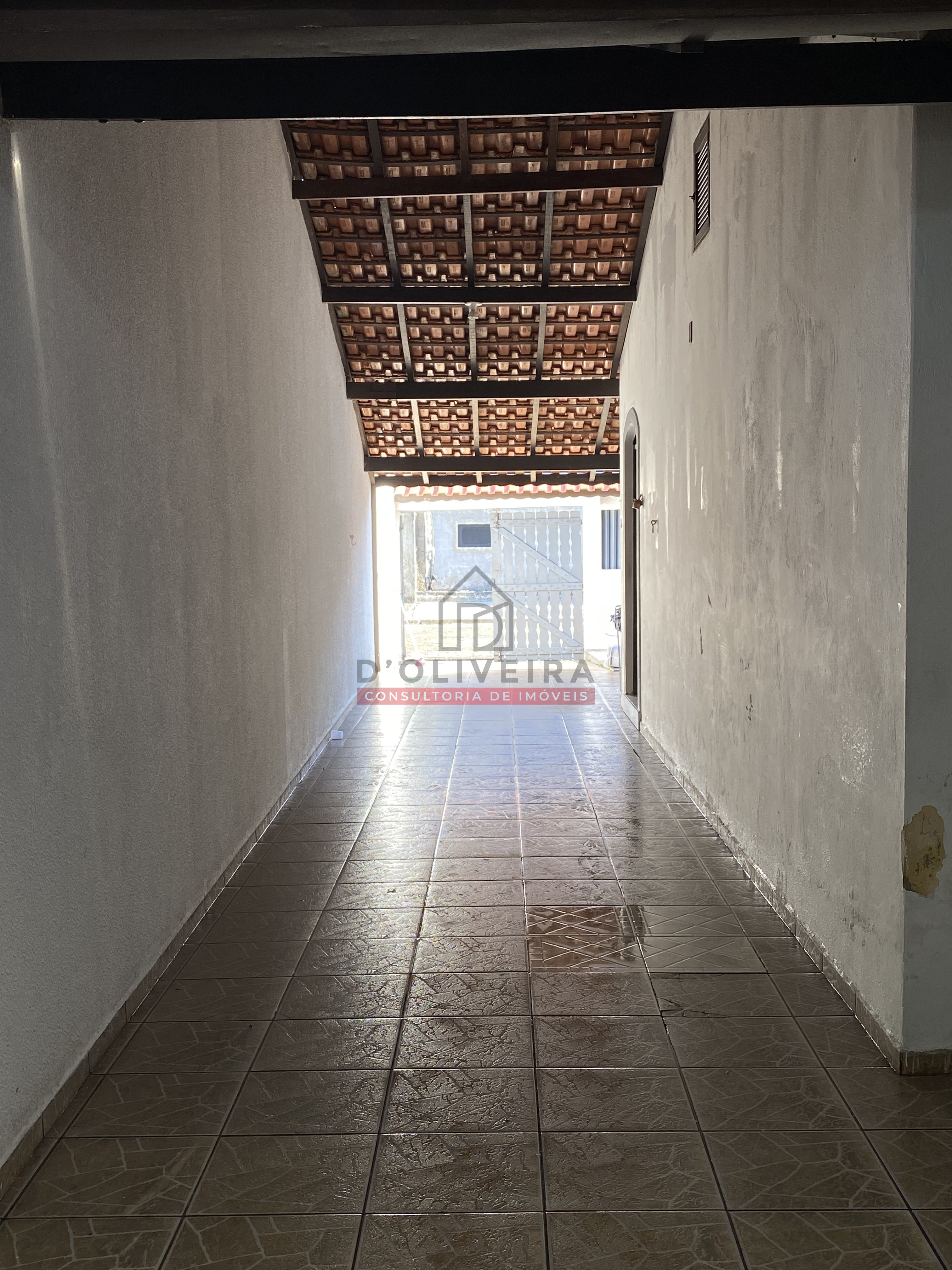 Casa térrea com edícula e churrasqueira no Bairro Jardim Veneza - Peruíbe - SP