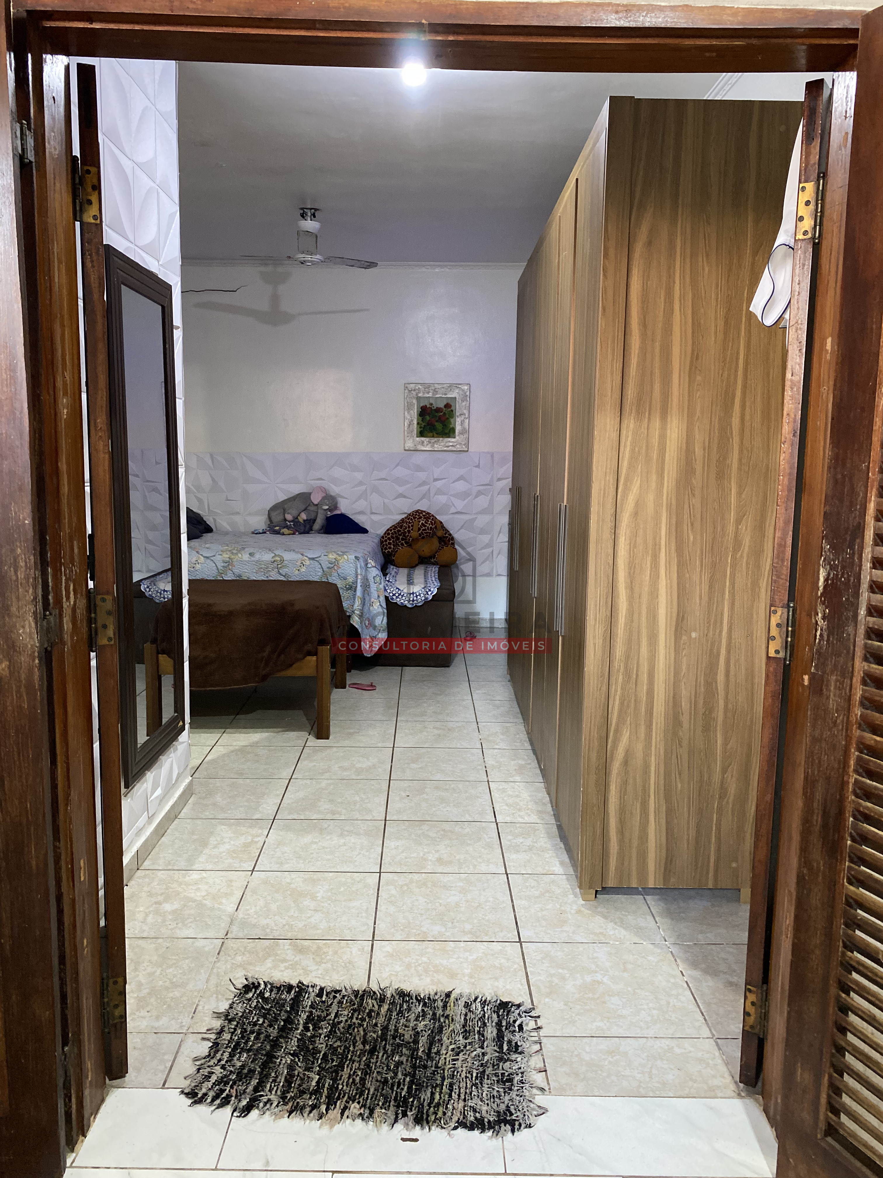 Casa térrea com edícula e churrasqueira no Bairro Jardim Veneza - Peruíbe - SP